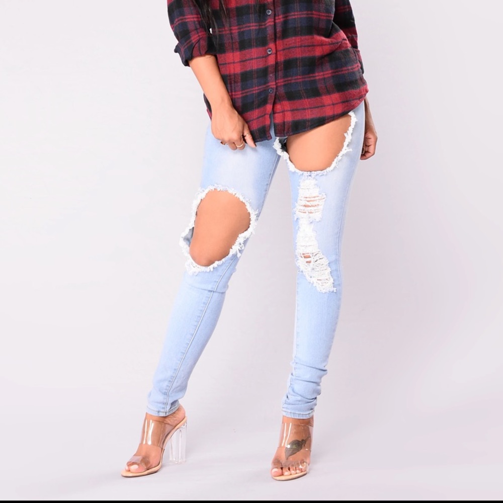 High waisted blue ripped skinny jeans